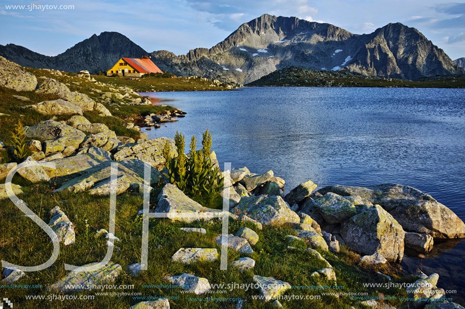 Last Ray of sun over Tevno Lake and Kamenitsa peak, Pirin mountain, Bulgaria