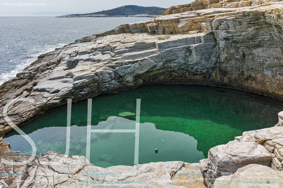 Clean waters of Giola Natural Pool in Thassos island, East Macedonia and Thrace, Greece