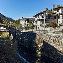 Autumn Landscape with Roman Bridge and old houses in town of Shiroka Laka, Smolyan Region, Bulgaria
