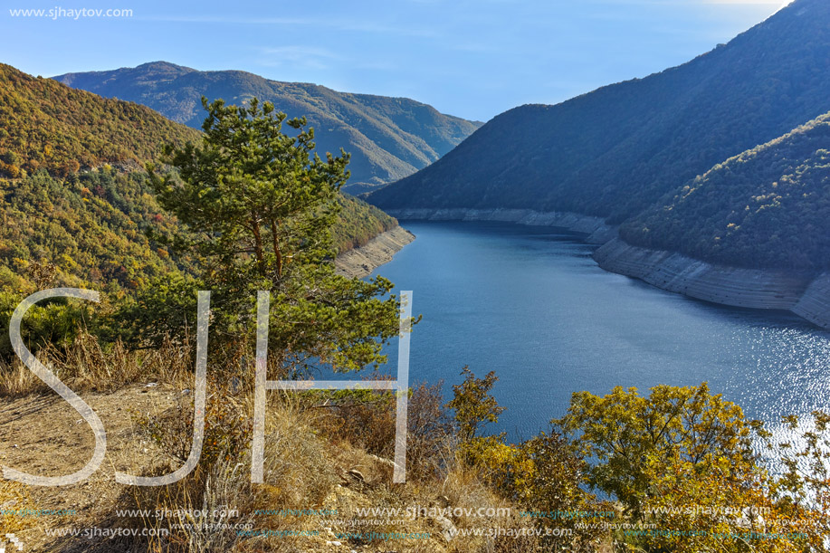 Autumn landscape of forest around Vacha (Antonivanovtsy) Reservoir, Rhodopes Mountain, Bulgaria