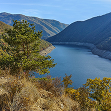 Autumn landscape of forest around Vacha (Antonivanovtsy) Reservoir, Rhodopes Mountain, Bulgaria