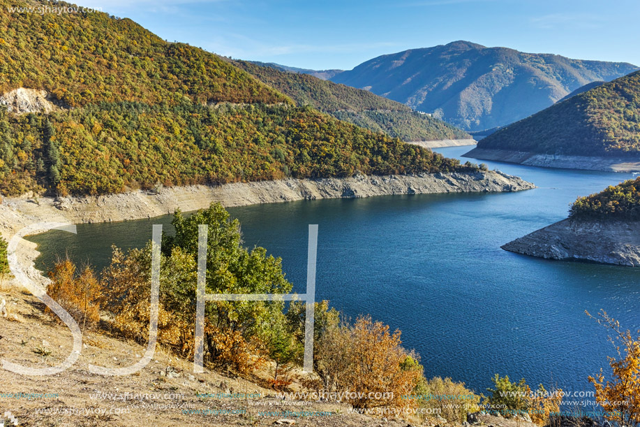 Autumn forest around Meander of Vacha (Antonivanovtsy) Reservoir, Rhodopes Mountain, Bulgaria