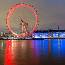 LONDON, ENGLAND - JUNE 16 2016: Night photo of The London Eye and County Hall, London, England, Great Britain