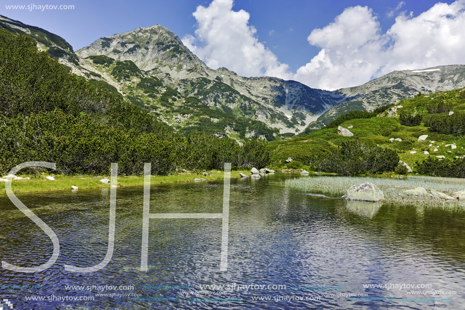 Landscape with Reflection of Muratov peak in river,  Pirin Mountain, Bulgaria