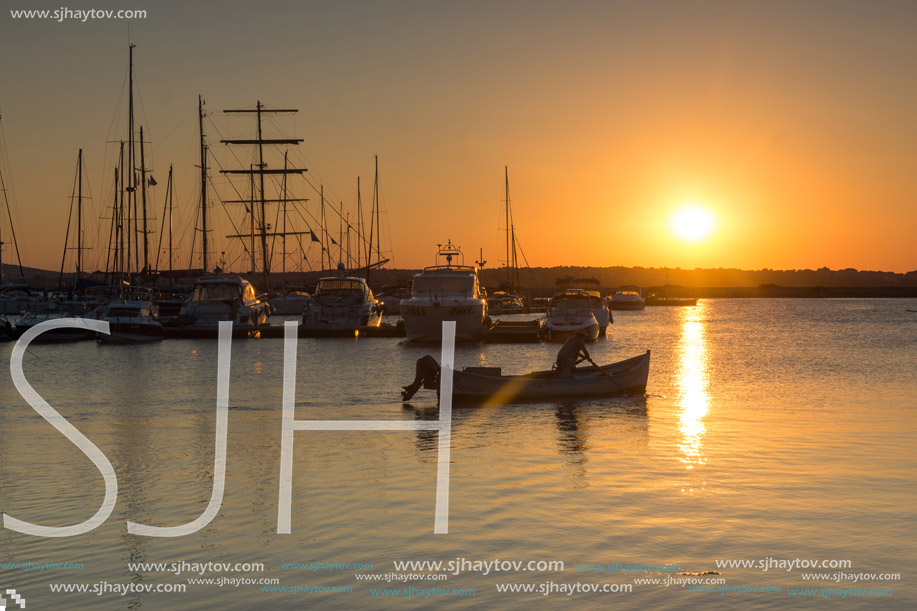 SOZOPOL, BULGARIA - JULY 11, 2016: Amazing Sunset at the port of Sozopol, Burgas Region, Bulgaria