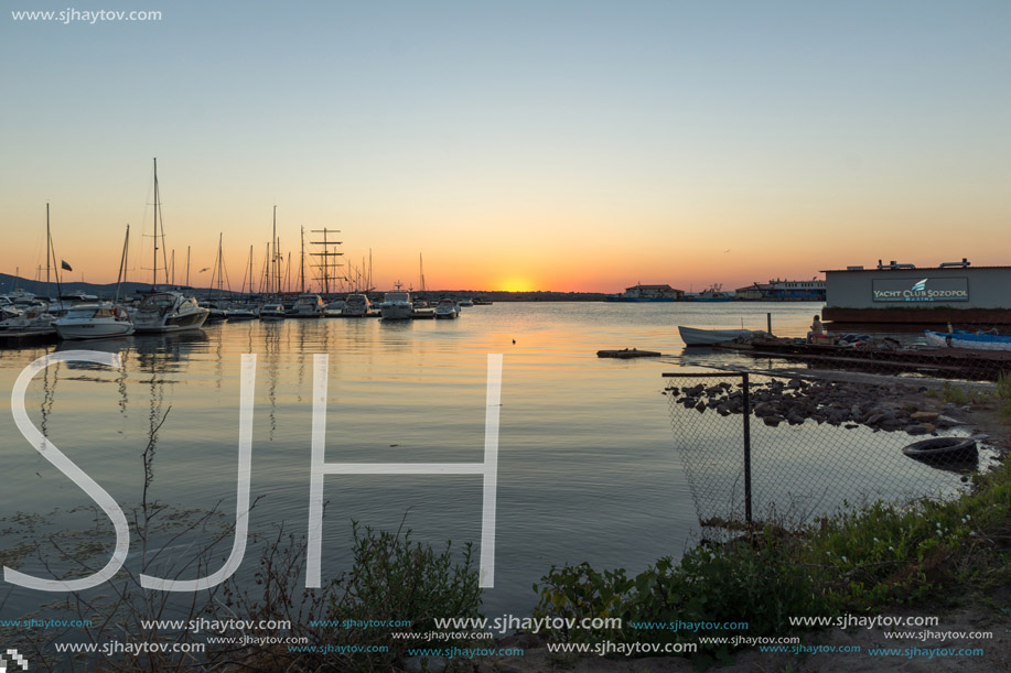 SOZOPOL, BULGARIA - JULY 11, 2016: Amazing Sunset at the port of Sozopol, Burgas Region, Bulgaria