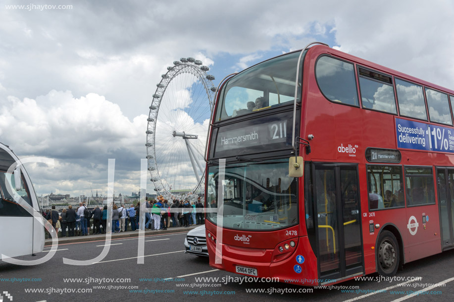 LONDON, ENGLAND - JUNE 15 2016:  Westminster Bridge and Red Bus, London, England, United Kingdom