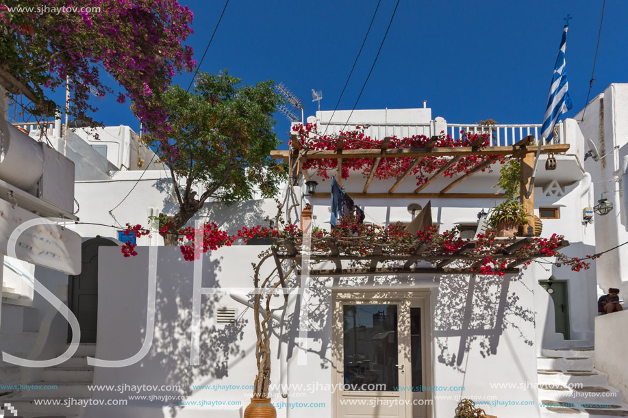 Street with white houses in town of Mykonos, Cyclades Islands, Greece