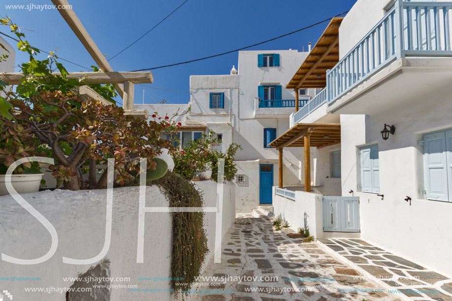 Street with white houses in town of Mykonos, Cyclades Islands, Greece