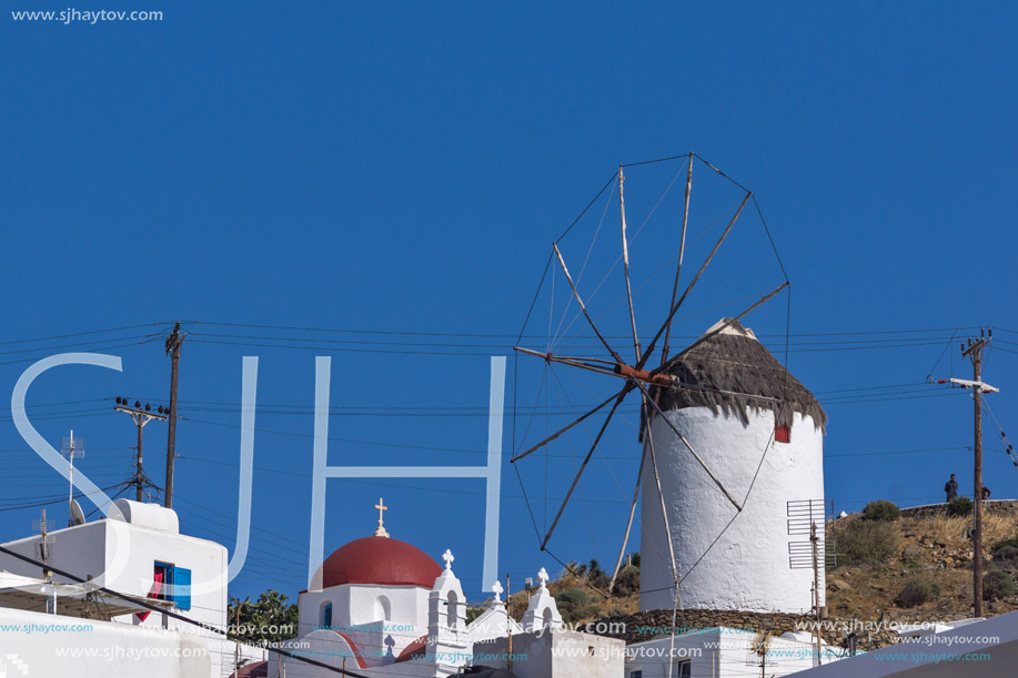 White windmill and blue sky on the island of Mykonos, Cyclades, Greece