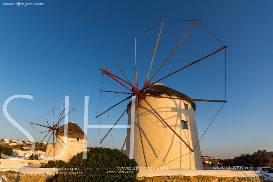 Sunset view of White windmills on the island of Mykonos, Cyclades, Greece