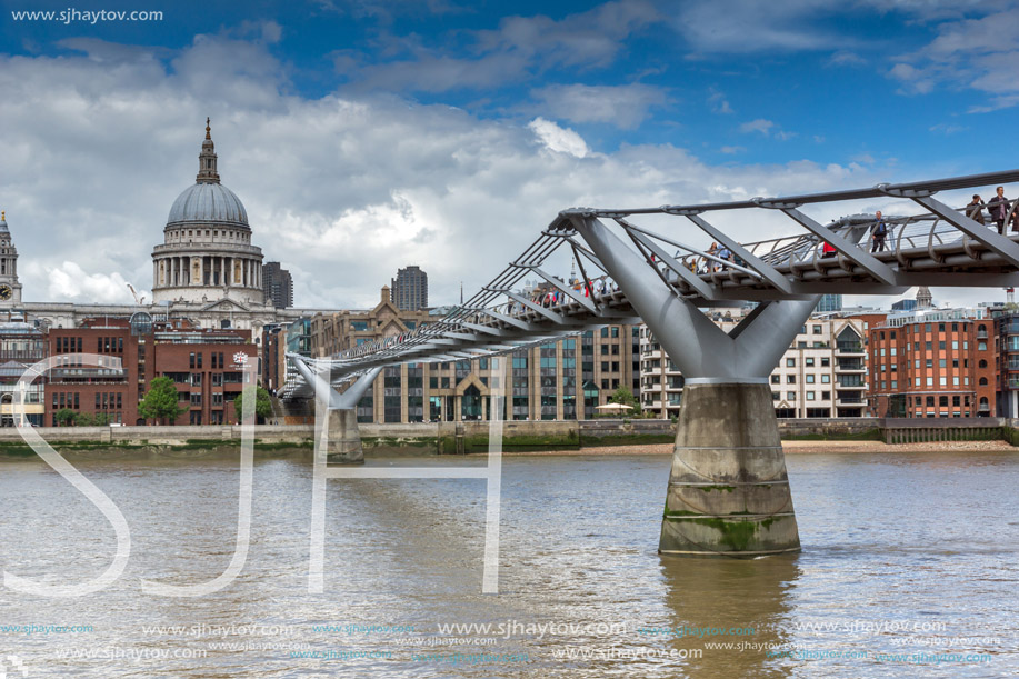 LONDON, ENGLAND - JUNE 15 2016: St. Paul"s Cathedral and Millennium bridge, London, England, Great Britain