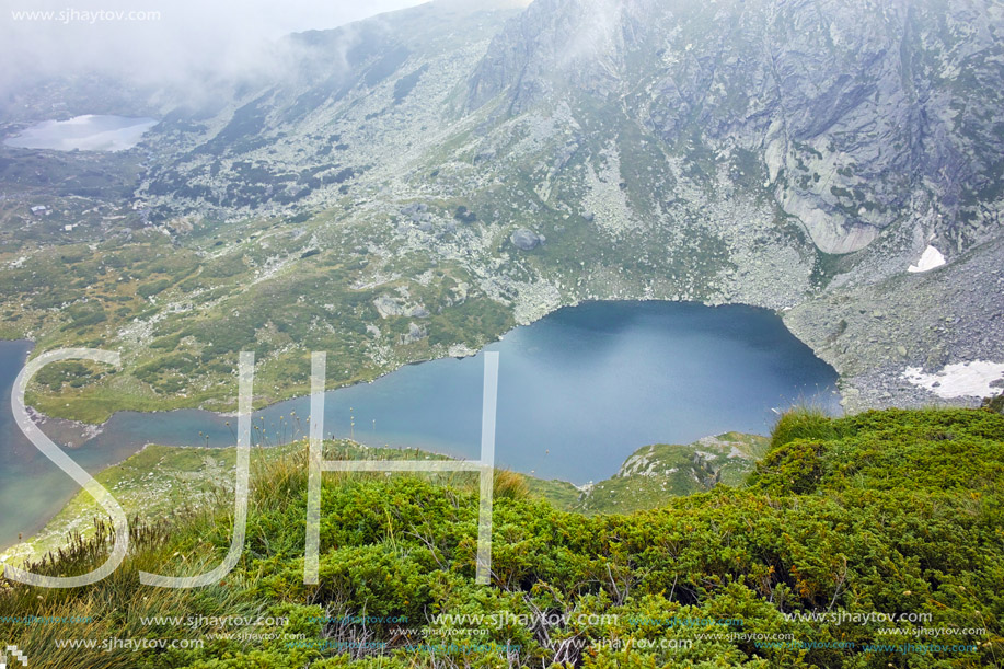 Amazing view with Fog over The Twin lake, The Seven Rila Lakes, Bulgaria