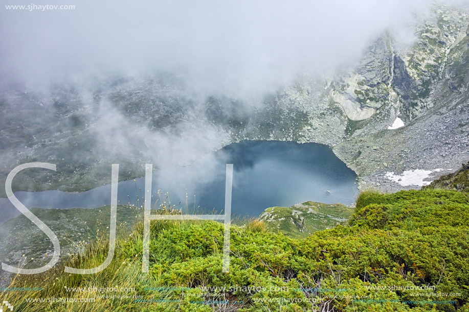 Amazing view with Fog over The Twin lake, The Seven Rila Lakes, Bulgaria