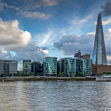 LONDON, ENGLAND - JUNE 15 2016: Sunset Panorama with The Shard skyscraper and Thames river, England, Great Britain