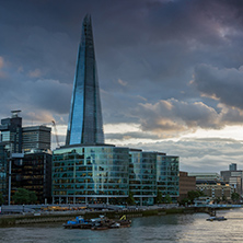 LONDON, ENGLAND - JUNE 15 2016: Sunset Panorama with The Shard skyscraper and Thames river, England, Great Britain