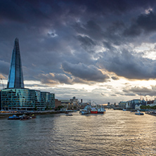 LONDON, ENGLAND - JUNE 15 2016: Sunset Panorama with The Shard skyscraper and Thames river, England, Great Britain