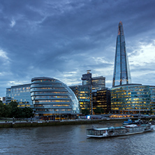 LONDON, ENGLAND - JUNE 15 2016: Sunset Panorama with The Shard skyscraper and Thames river, England, Great Britain