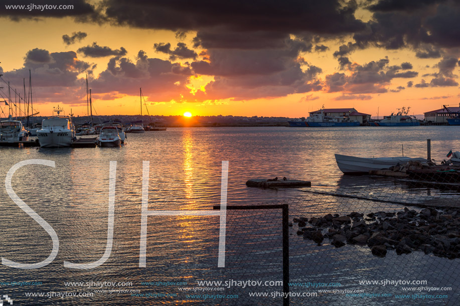 SOZOPOL, BULGARIA - JULY 12, 2016: Amazing Sunset at the port of Sozopol, Burgas Region, Bulgaria