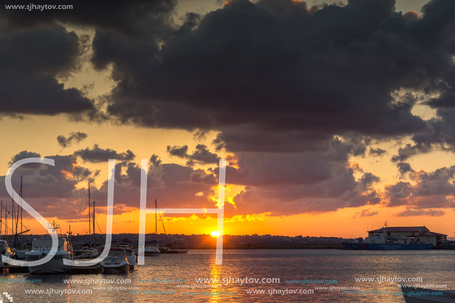 SOZOPOL, BULGARIA - JULY 12, 2016: Amazing Sunset at the port of Sozopol, Burgas Region, Bulgaria