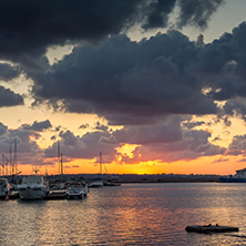 SOZOPOL, BULGARIA - JULY 12, 2016: Amazing Sunset at the port of Sozopol, Burgas Region, Bulgaria