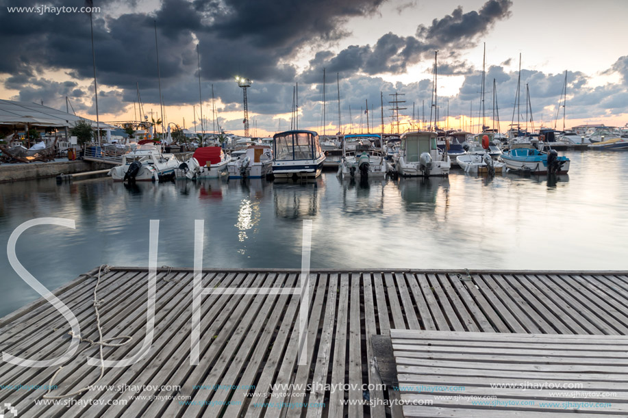 SOZOPOL, BULGARIA - JULY 12, 2016: Amazing Sunset at the port of Sozopol, Burgas Region, Bulgaria