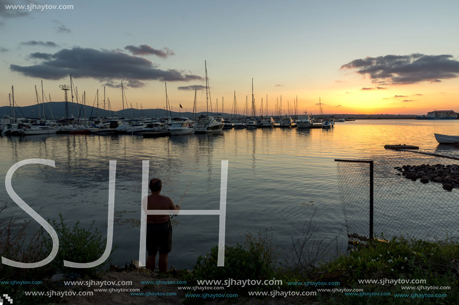 SOZOPOL, BULGARIA - JULY 13, 2016: Amazing Sunset at the port of Sozopol, Burgas Region, Bulgaria