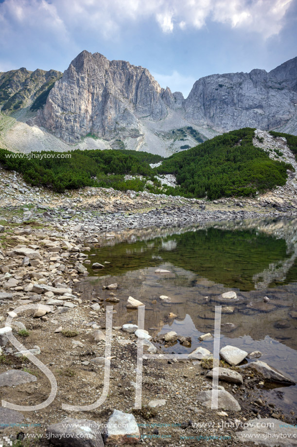 Reflection of Sinanitsa Peak in the lake, Pirin Mountain, Bulgaria