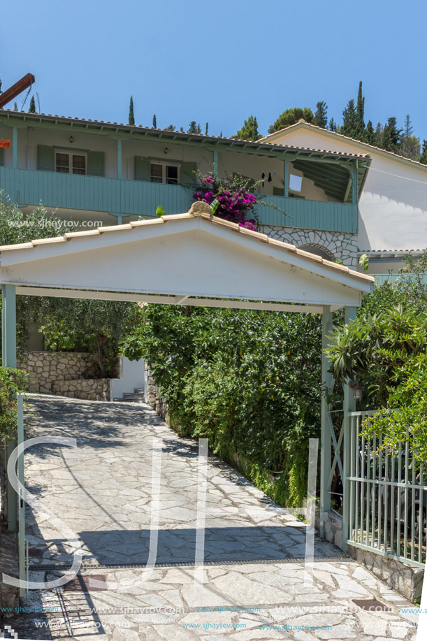 AGIOS NIKITAS, LEFKADA, GREECE JULY 16, 2014: Traditional houses in village of Agios Nikitas, Lefkada, Ionian Islands, Greece