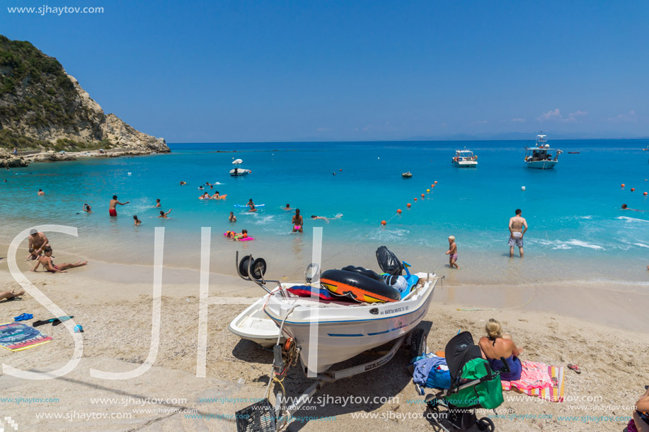 AGIOS NIKITAS, LEFKADA, GREECE JULY 16, 2014: Blue waters of beach of village of Agios Nikitas, Lefkada, Ionian Islands, Greece