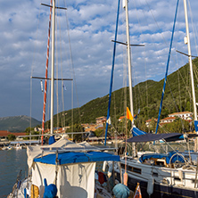 VASILIKI, LEFKADA, GREECE JULY 16, 2014: View at sunset on the promenade in Vasiliki, Lefkada, Ionian Islands, Greece