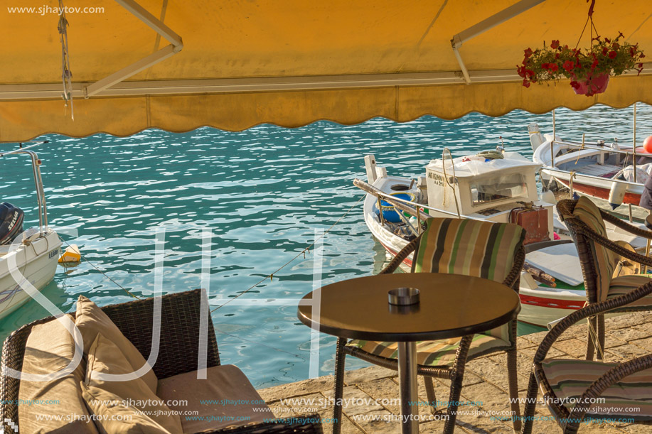 VASILIKI, LEFKADA, GREECE JULY 16, 2014: View at sunset on the promenade in Vasiliki, Lefkada, Ionian Islands, Greece