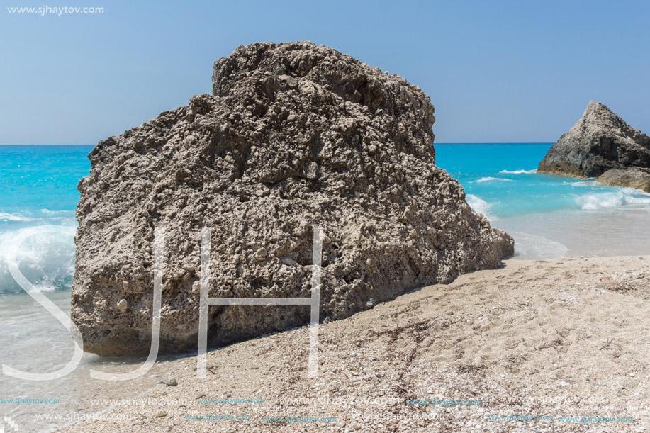 Amazing seascape of blue waters of Megali Petra Beach, Lefkada, Ionian Islands, Greece