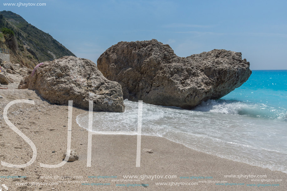 Amazing seascape of blue waters of Megali Petra Beach, Lefkada, Ionian Islands, Greece