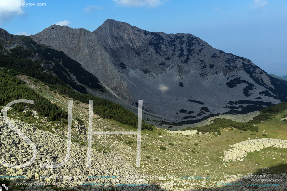 Amazing Panorama of rocks of Sinanitsa peak covered with shadow, Pirin Mountain, Bulgaria