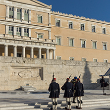 ATHENS, GREECE - JANUARY 19 2017:  Evzones - presidential ceremonial guards in the Tomb of the Unknown Soldier at the Greek Parliament, Athens, Greece