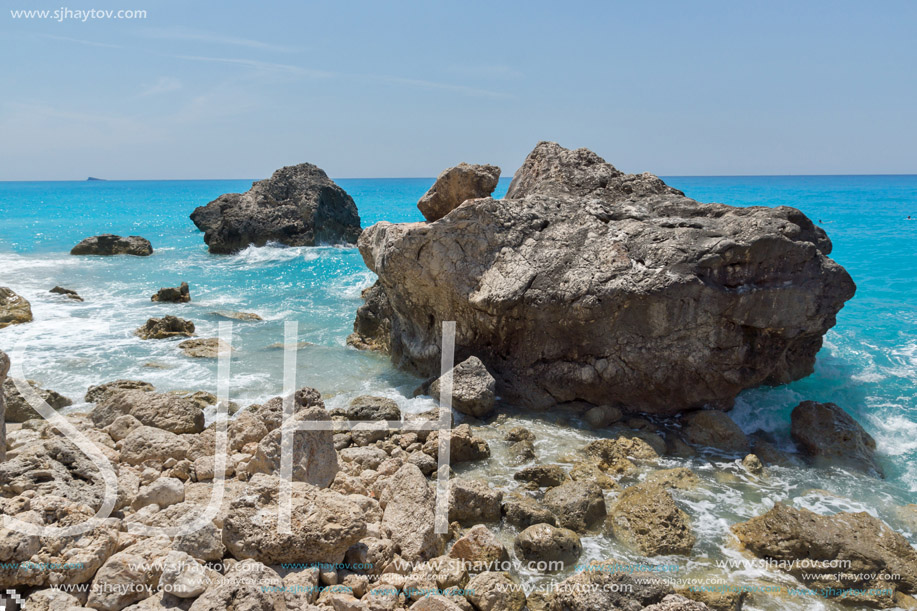 Seascape with rocks in blue waters of Megali Petra Beach, Lefkada, Ionian Islands, Greece