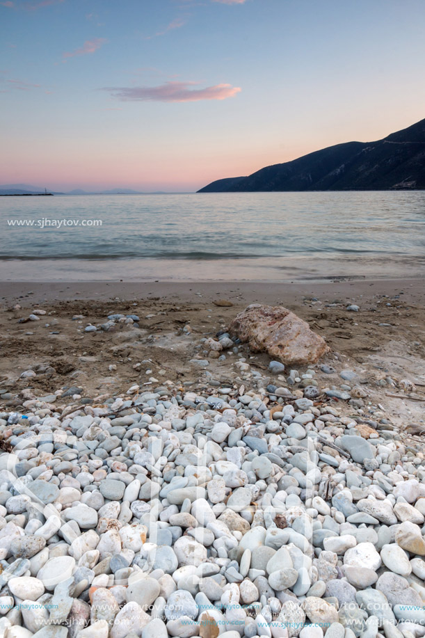 Sunset view on the beach of village of Vasiliki, Lefkada, Ionian Islands, Greece