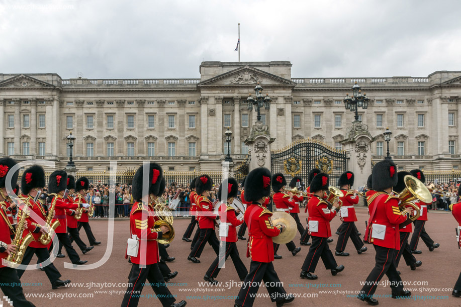 LONDON, ENGLAND - JUNE 17 2016: British Royal guards perform the Changing of the Guard in Buckingham Palace, London, England, Great Britain