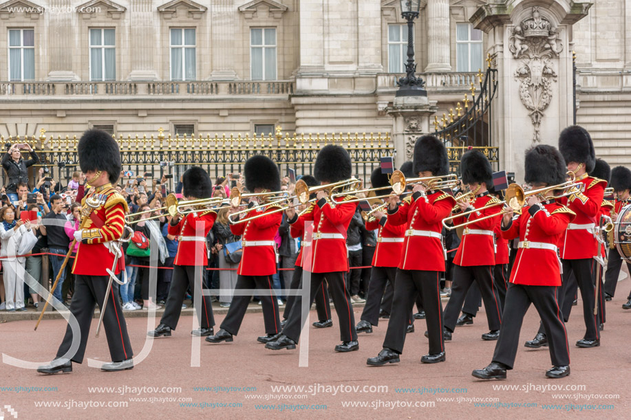 LONDON, ENGLAND - JUNE 17 2016: British Royal guards perform the Changing of the Guard in Buckingham Palace, London, England, Great Britain