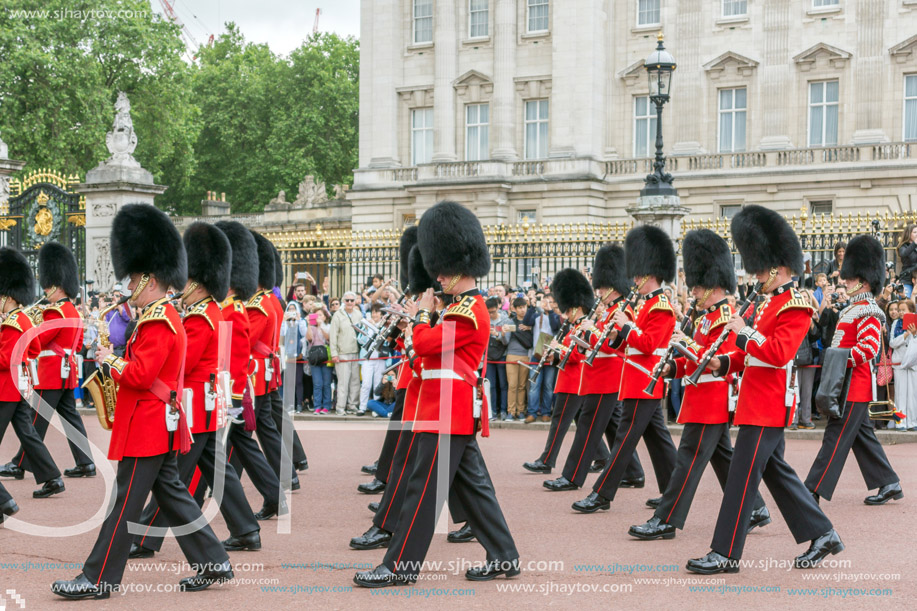 LONDON, ENGLAND - JUNE 17 2016: British Royal guards perform the Changing of the Guard in Buckingham Palace, London, England, Great Britain