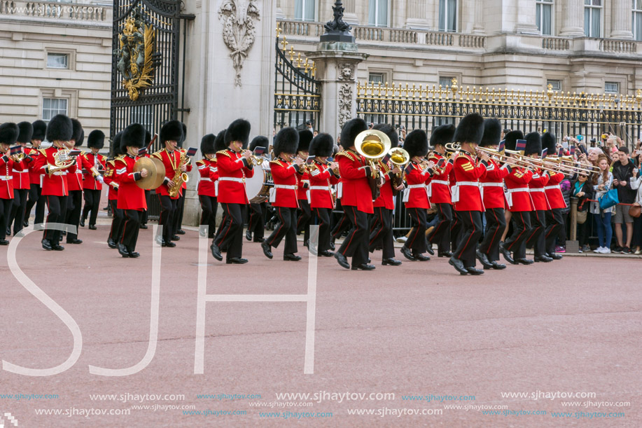 LONDON, ENGLAND - JUNE 17 2016: British Royal guards perform the Changing of the Guard in Buckingham Palace, London, England, Great Britain