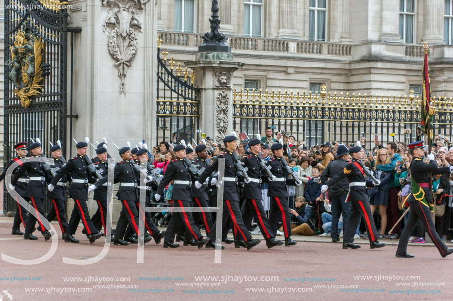 LONDON, ENGLAND - JUNE 17 2016: British Royal guards perform the Changing of the Guard in Buckingham Palace, London, England, Great Britain