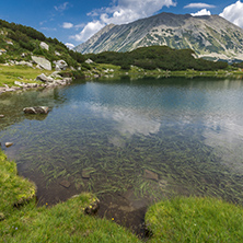 Panorama with Todorka Peak and reflection in Muratovo lake, Pirin Mountain, Bulgaria