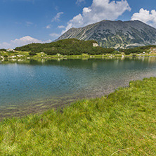 Panorama with Todorka Peak and reflection in Muratovo lake, Pirin Mountain, Bulgaria