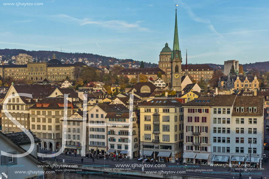 ZURICH, SWITZERLAND - OCTOBER 28, 2015: Reflection of City of Zurich in Limmat River, Switzerland