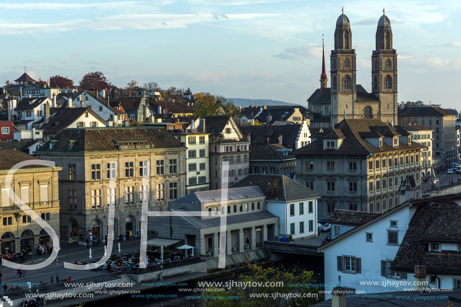 ZURICH, SWITZERLAND - OCTOBER 28, 2015: Reflection of City of Zurich in Limmat River, Switzerland