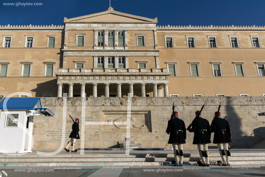 ATHENS, GREECE - JANUARY 19 2017:  Evzones - presidential ceremonial guards in the Tomb of the Unknown Soldier at the Greek Parliament, Athens, Greece
