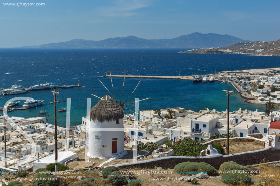 Panorama of white windmill and island of Mykonos, Cyclades, Greece