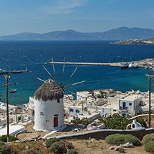 Panorama of white windmill and island of Mykonos, Cyclades, Greece